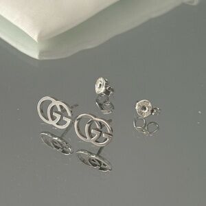 Gucci Silver Logo Stud Earrings